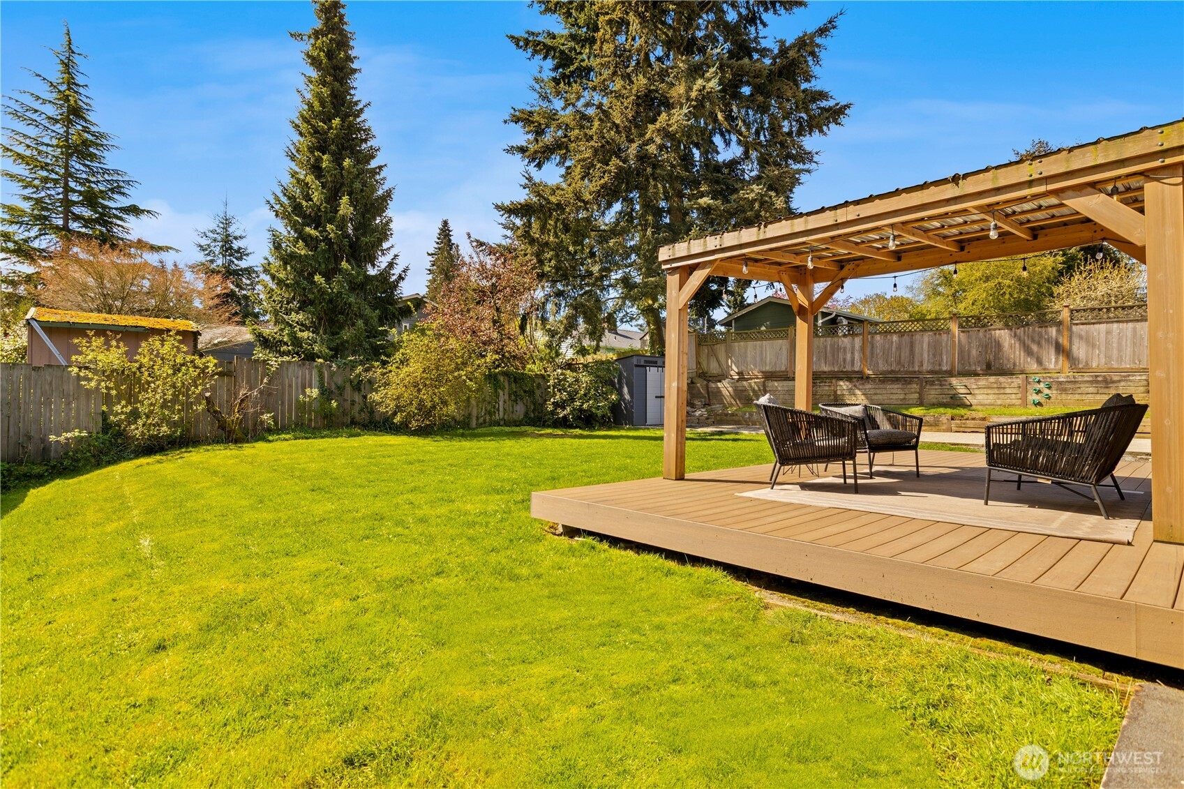 1259 North 173rd Street Shoreline, WA 98133 - Photo 29 of 37 a view of a patio with a table and chairs