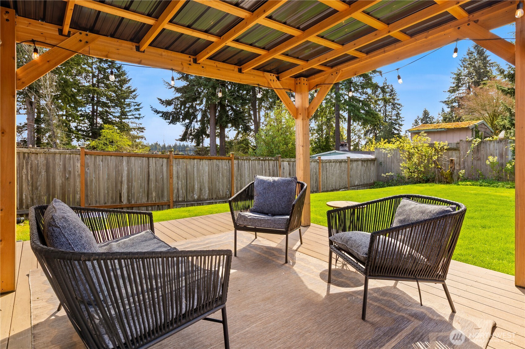1259 North 173rd Street Shoreline, WA 98133 - Photo 30 of 37 a view of a chair and table in the patio
