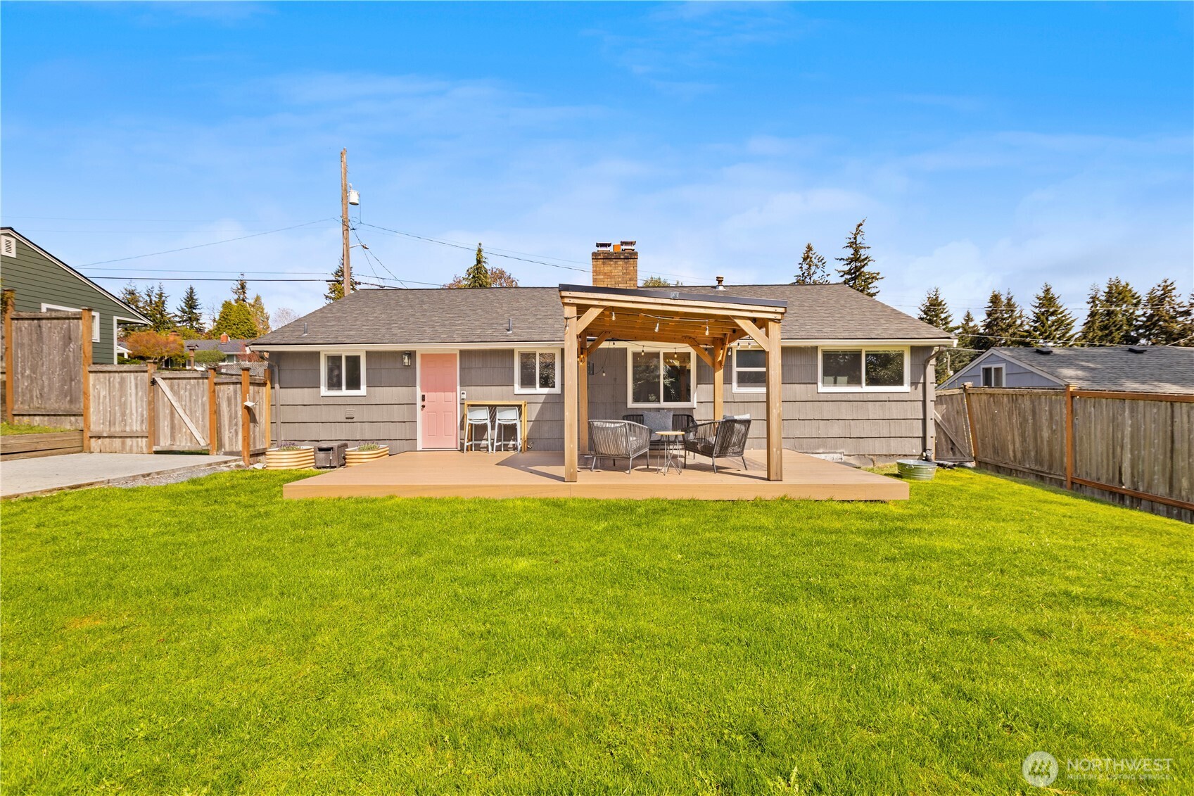 1259 North 173rd Street Shoreline, WA 98133 - Photo 34 of 37 a front view of a house with swimming pool having outdoor seating