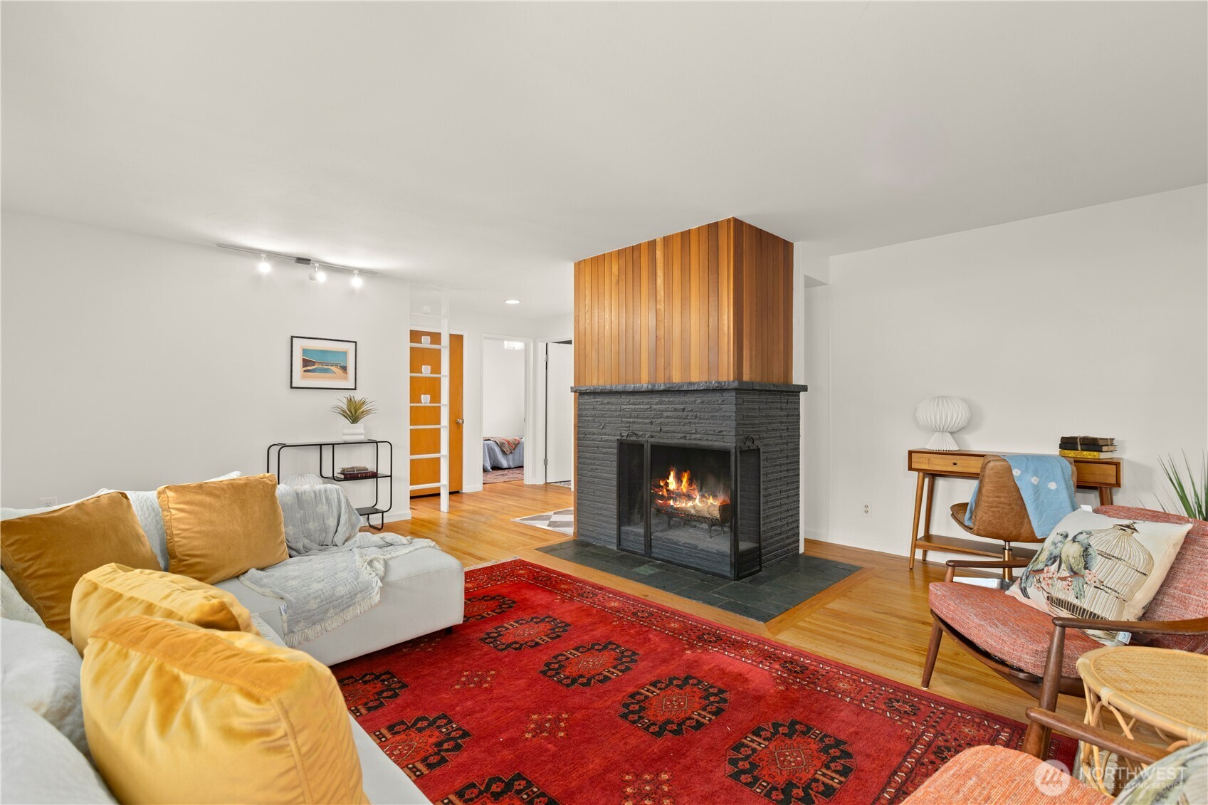 1259 North 173rd Street Shoreline, WA 98133 - Photo 7 of 37 a living room with furniture and a fireplace