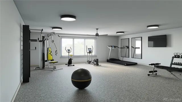 a room with gym equipment and a window