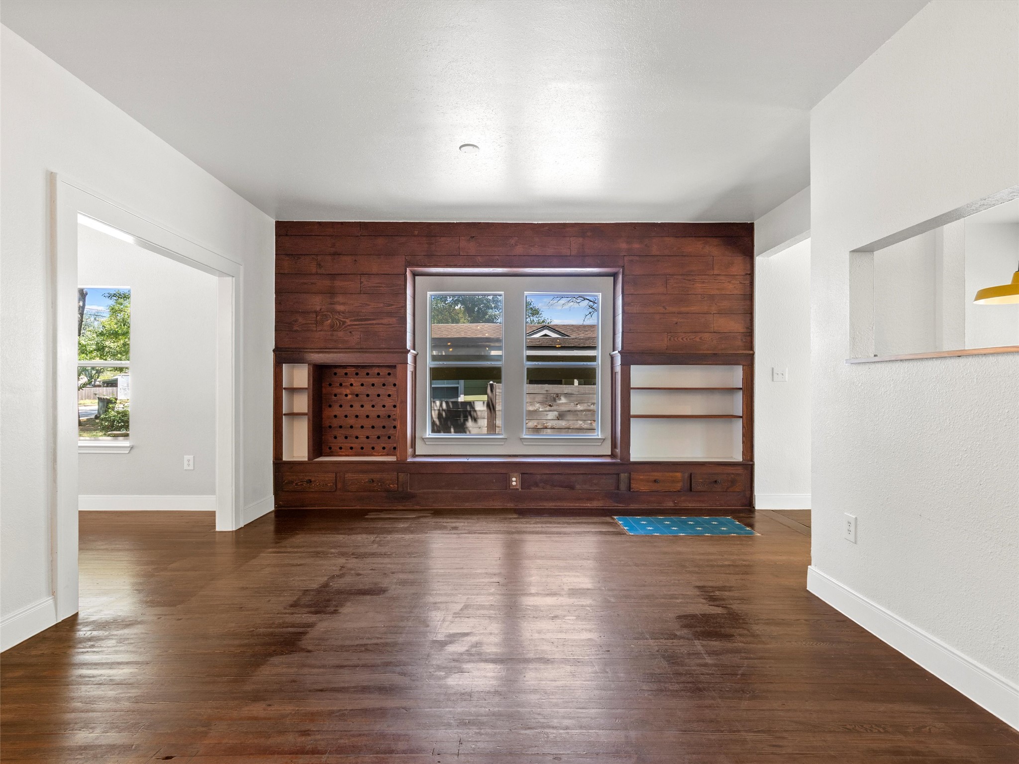 1809 Wilson Street Bastrop, TX 78602 - Photo 12 of 40 a view of empty room with wooden floor and fan