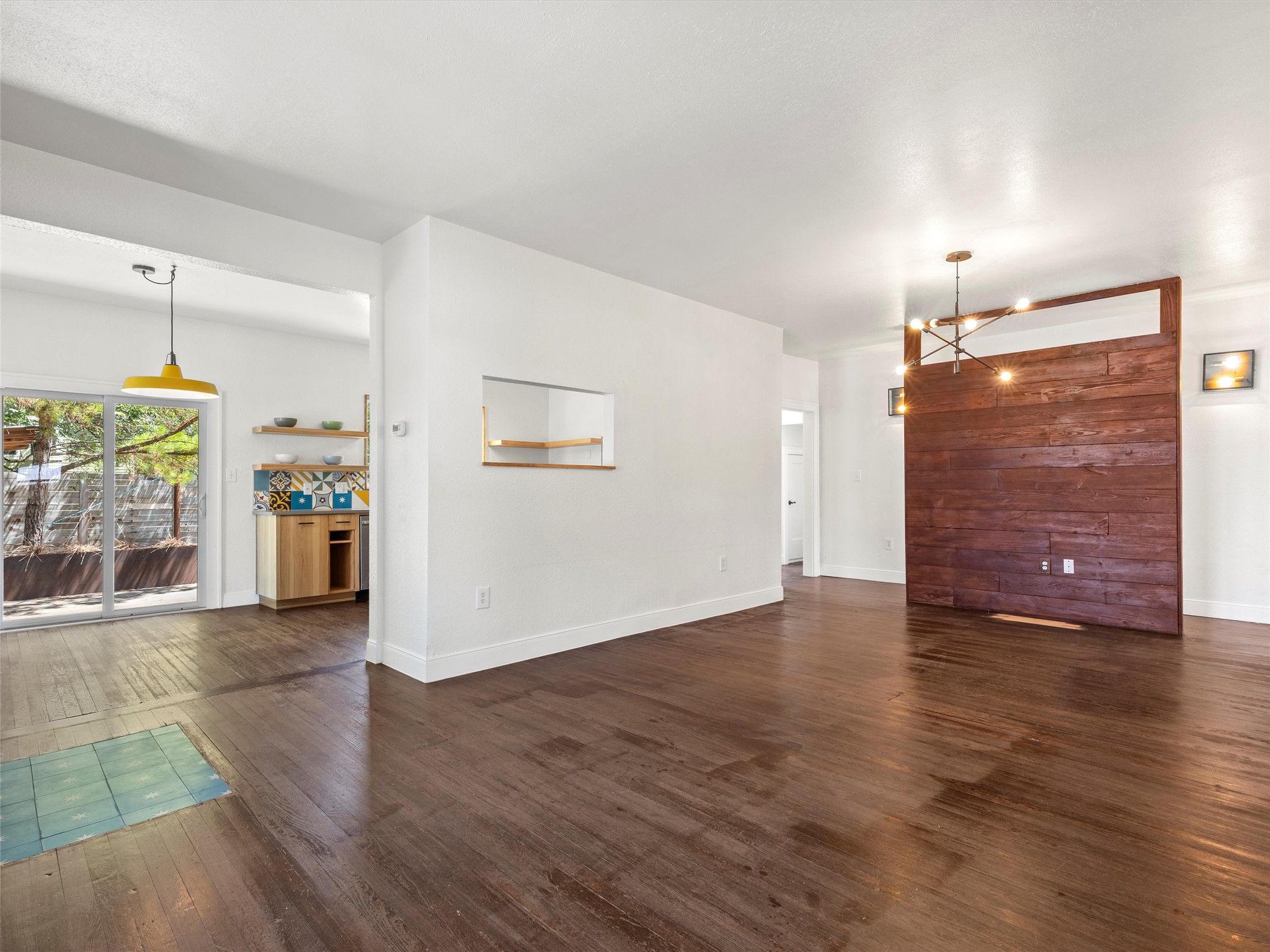 1809 Wilson Street Bastrop, TX 78602 - Photo 14 of 40 a view of a livingroom with an empty space & a window