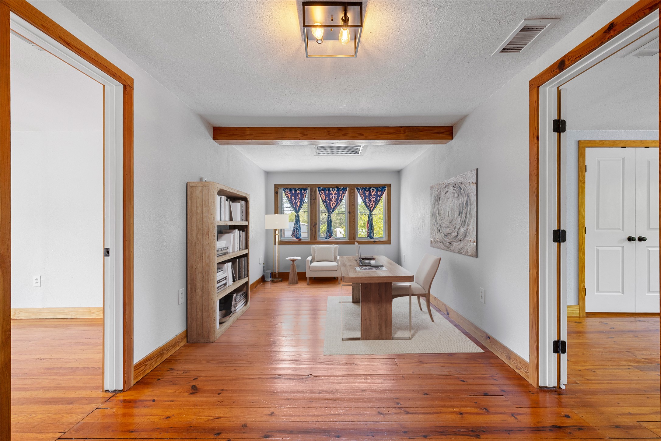 1809 Wilson Street Bastrop, TX 78602 - Photo 21 of 40 a living room with furniture and a wooden floor