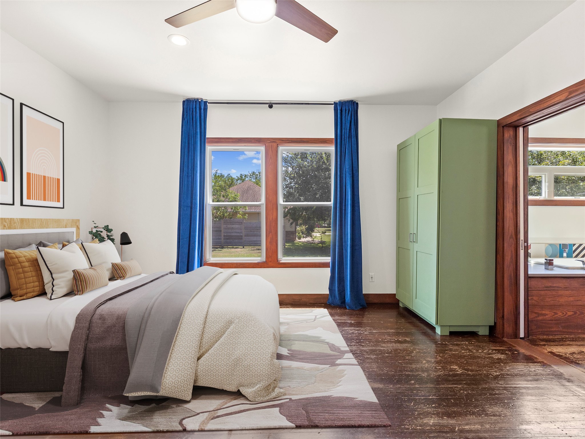 1809 Wilson Street Bastrop, TX 78602 - Photo 24 of 40 a bedroom with a large bed and a large window
