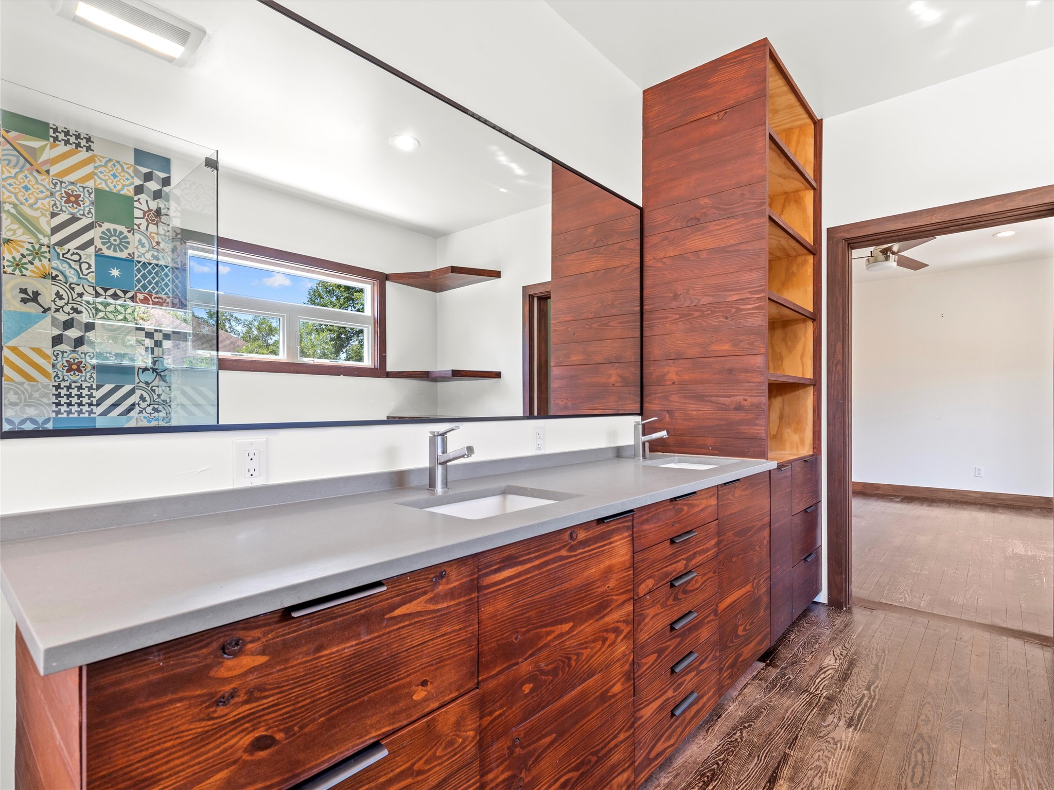 1809 Wilson Street Bastrop, TX 78602 - Photo 26 of 40 a bathroom with a sink and a mirror