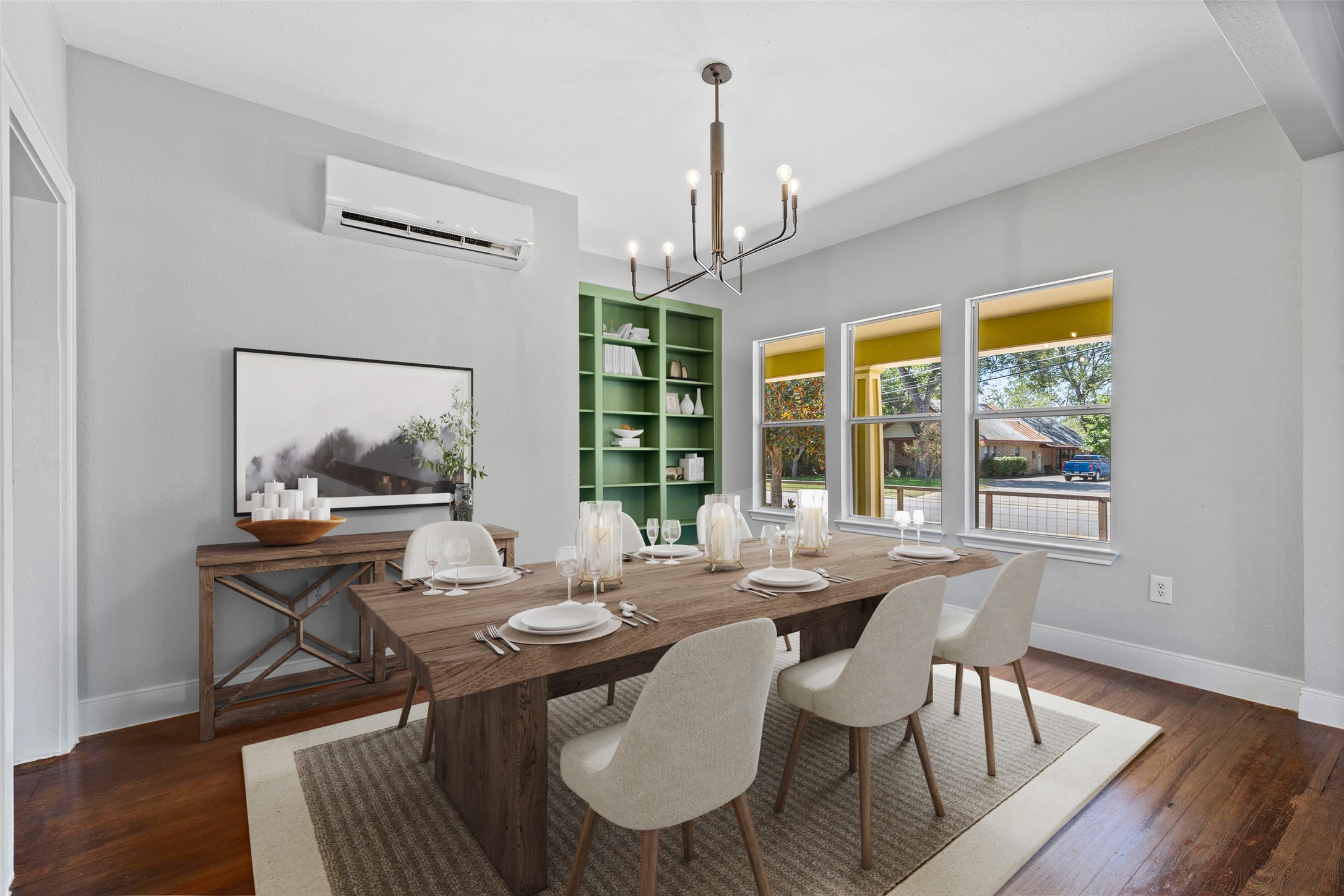 1809 Wilson Street Bastrop, TX 78602 - Photo 8 of 40 a view of a dining room with furniture window and wooden floor