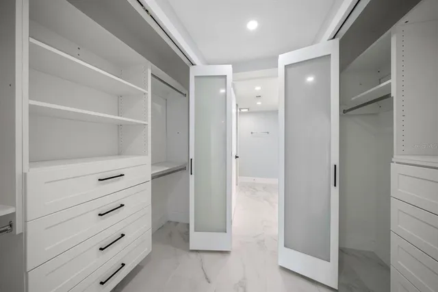 a view of an empty walk in closet