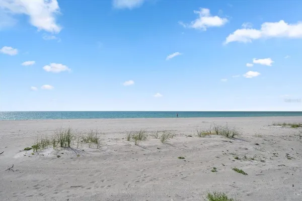a view of ocean with beach