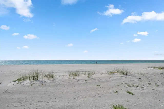 a view of ocean with beach