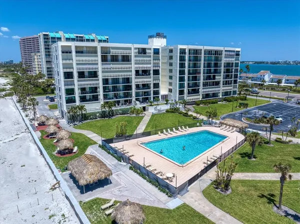 front view of a house with a swimming pool