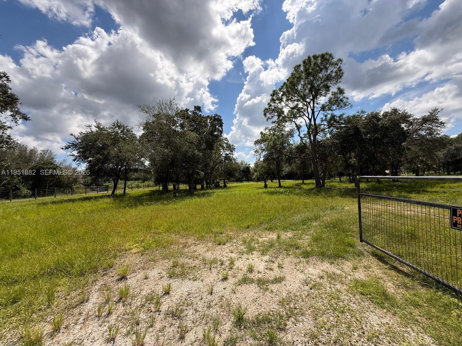 260 Ave Del Centro Clewiston, FL 33440 - Photo 3 of 10 a view of a golf course with a lake