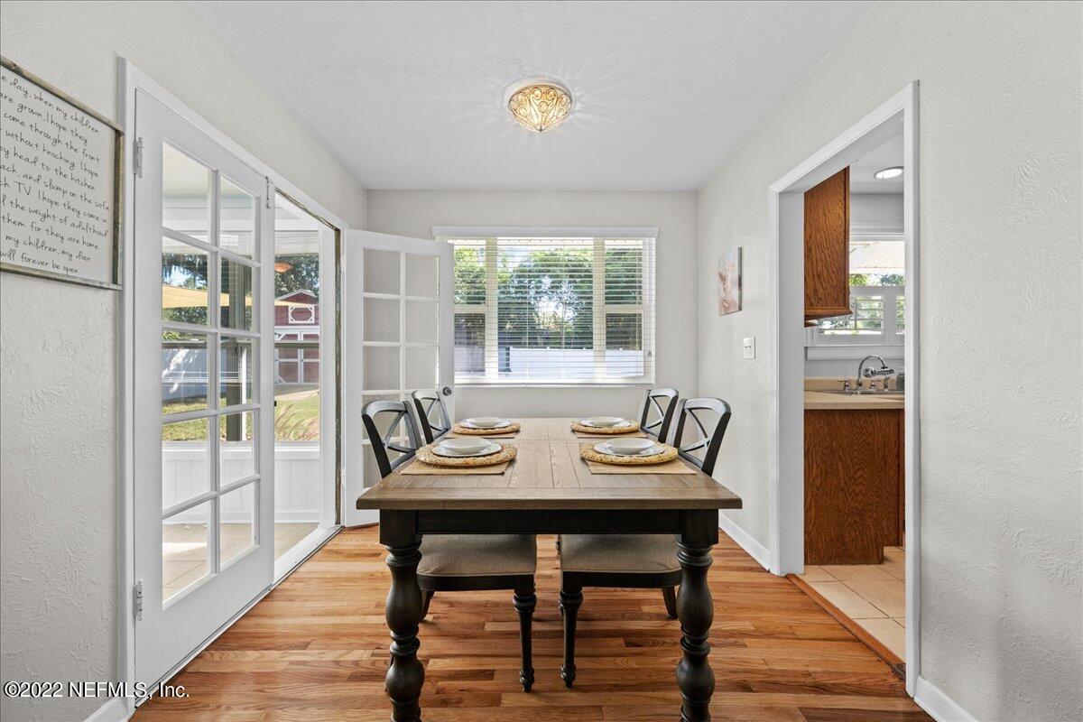 6115 Duke Road Jacksonville, FL 32217 - Photo 8 of 24 a view of a dining room with furniture window and outside view