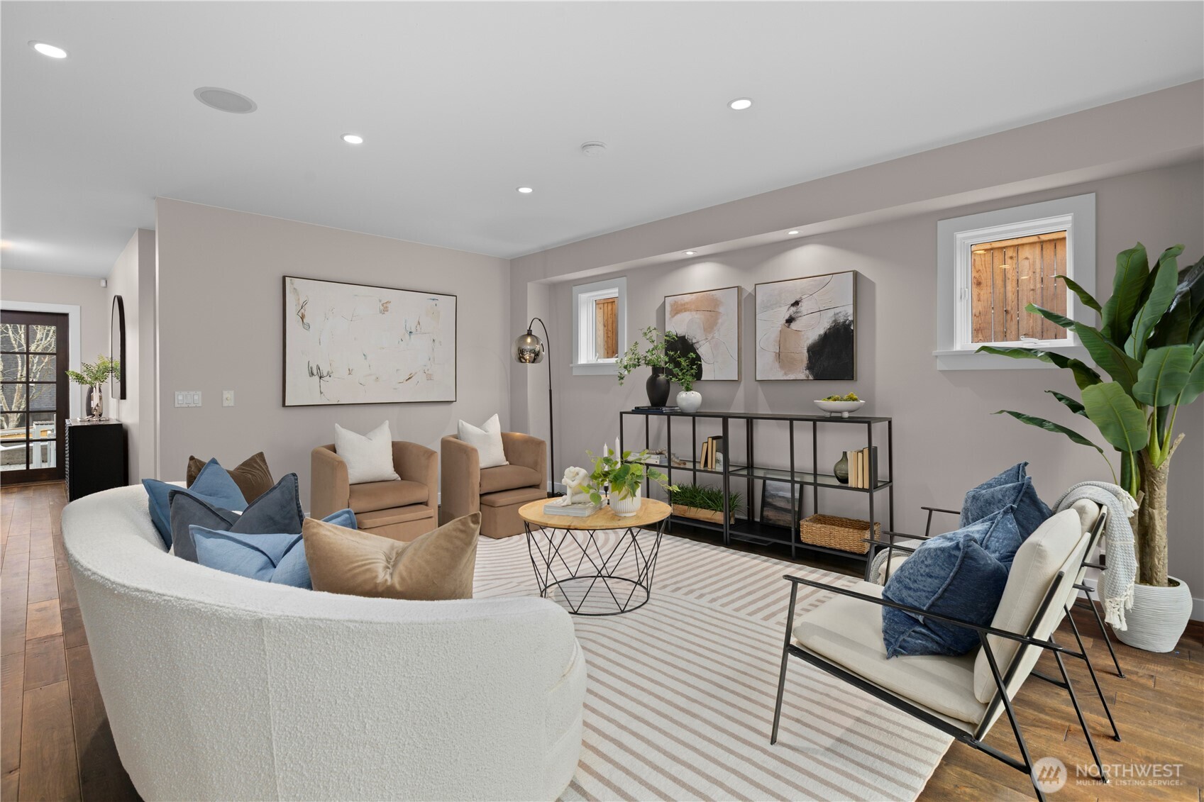 3773 Southwest Grayson Street Seattle, WA 98126 - Photo 11 of 40 a living room with furniture and a wooden floor