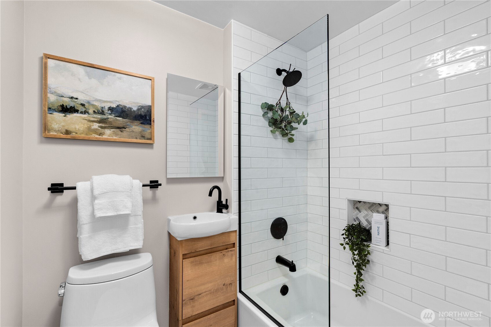 3773 Southwest Grayson Street Seattle, WA 98126 - Photo 19 of 40 a bathroom with a bathtub and toilet