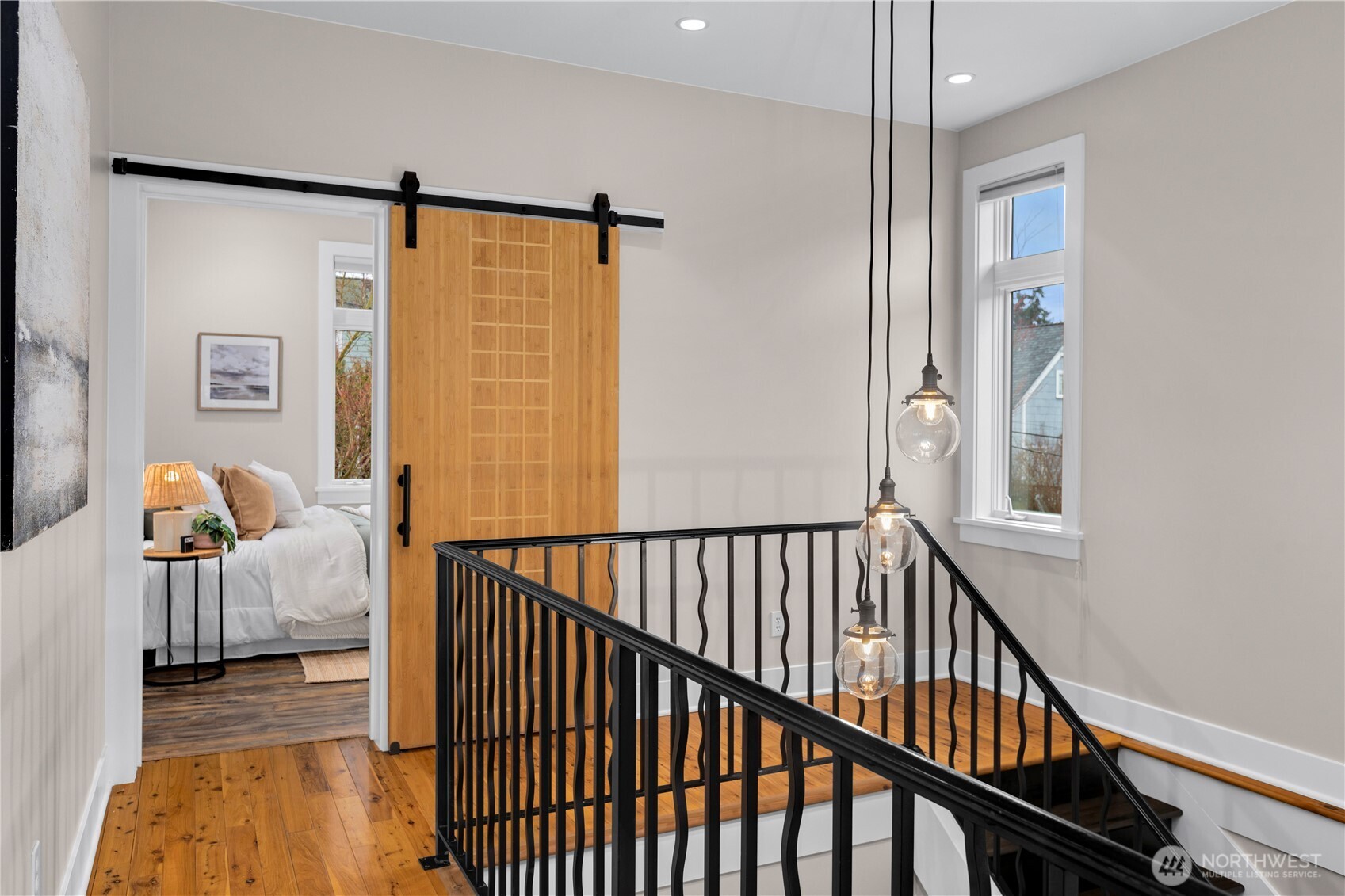 3773 Southwest Grayson Street Seattle, WA 98126 - Photo 20 of 40 a view of a hallway with bedroom and a window