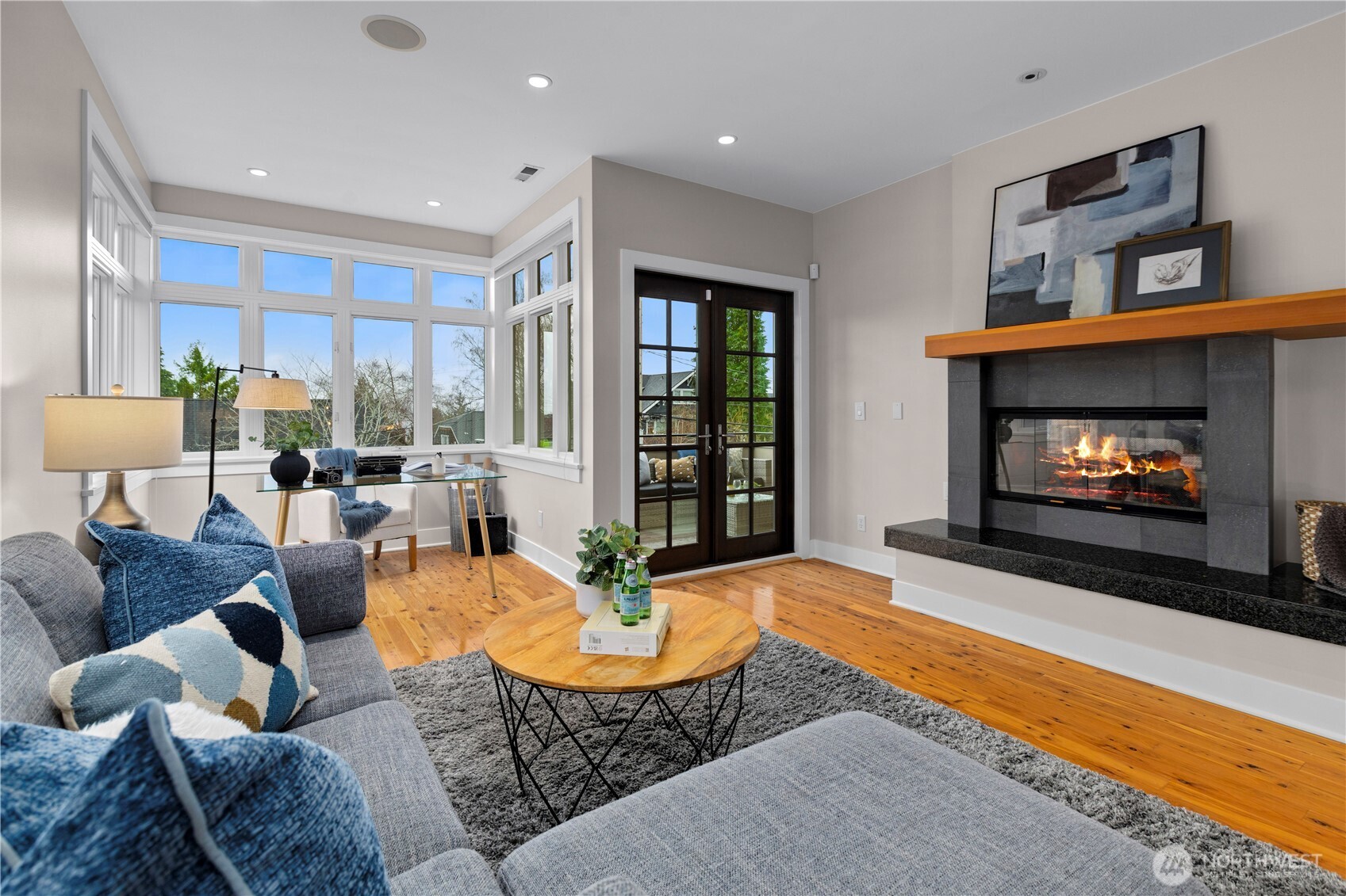 3773 Southwest Grayson Street Seattle, WA 98126 - Photo 25 of 40 a living room with furniture and a fireplace