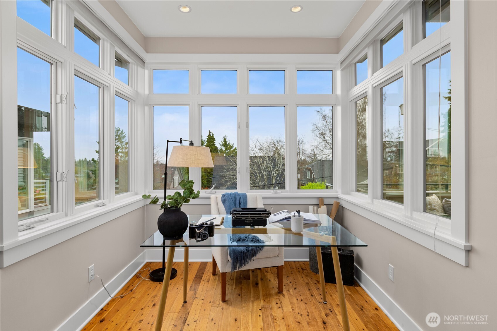 3773 Southwest Grayson Street Seattle, WA 98126 - Photo 26 of 40 a living room with furniture and floor to ceiling windows