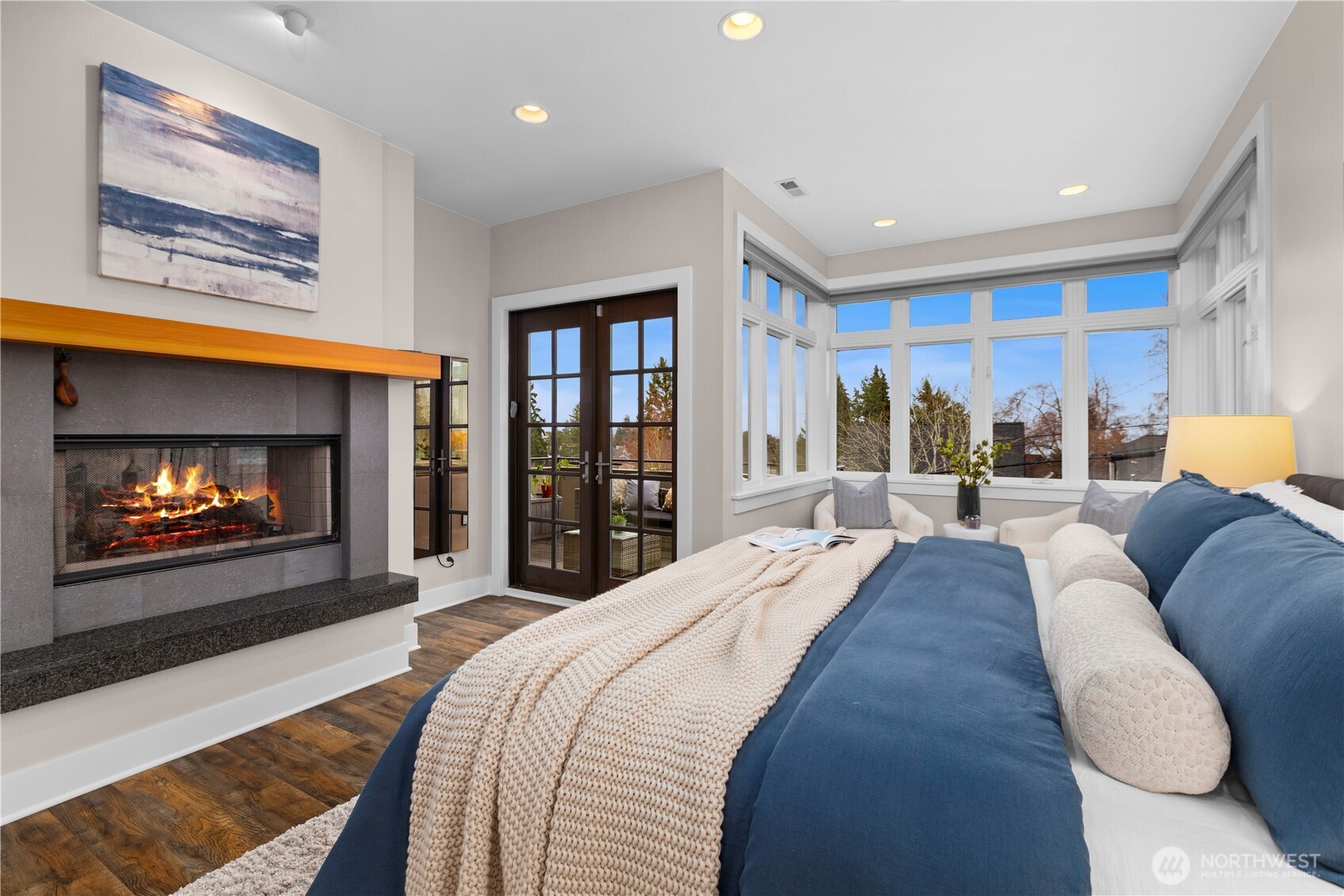 3773 Southwest Grayson Street Seattle, WA 98126 - Photo 29 of 40 a bed room with furniture and a fireplace