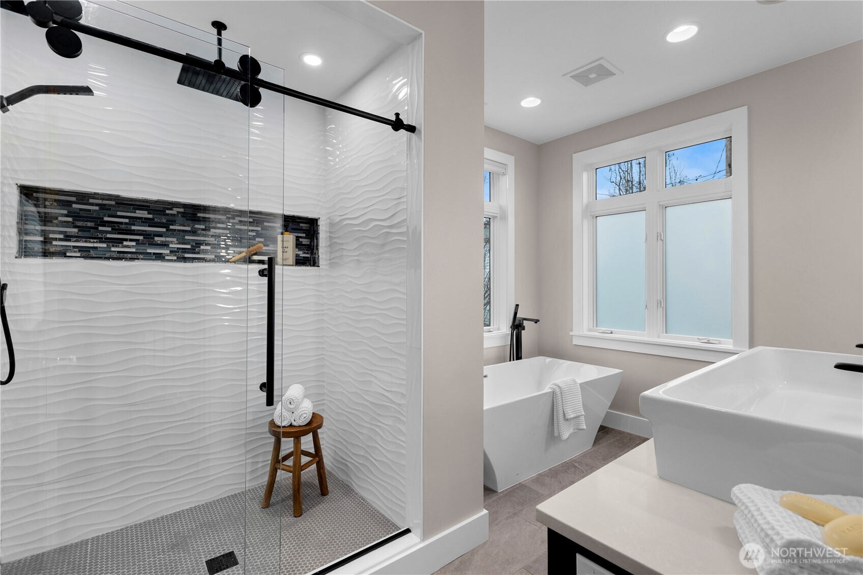 3773 Southwest Grayson Street Seattle, WA 98126 - Photo 32 of 40 a bathroom with a sink a toilet and shower