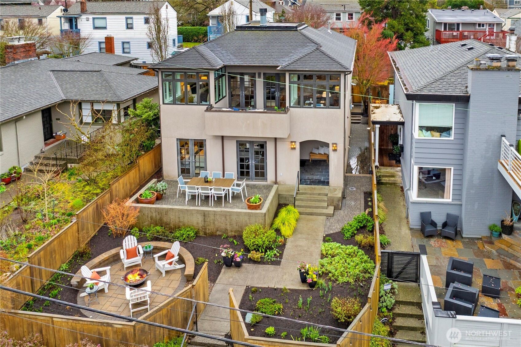 3773 Southwest Grayson Street Seattle, WA 98126 - Photo 40 of 40 a front view of a multi story building with yard