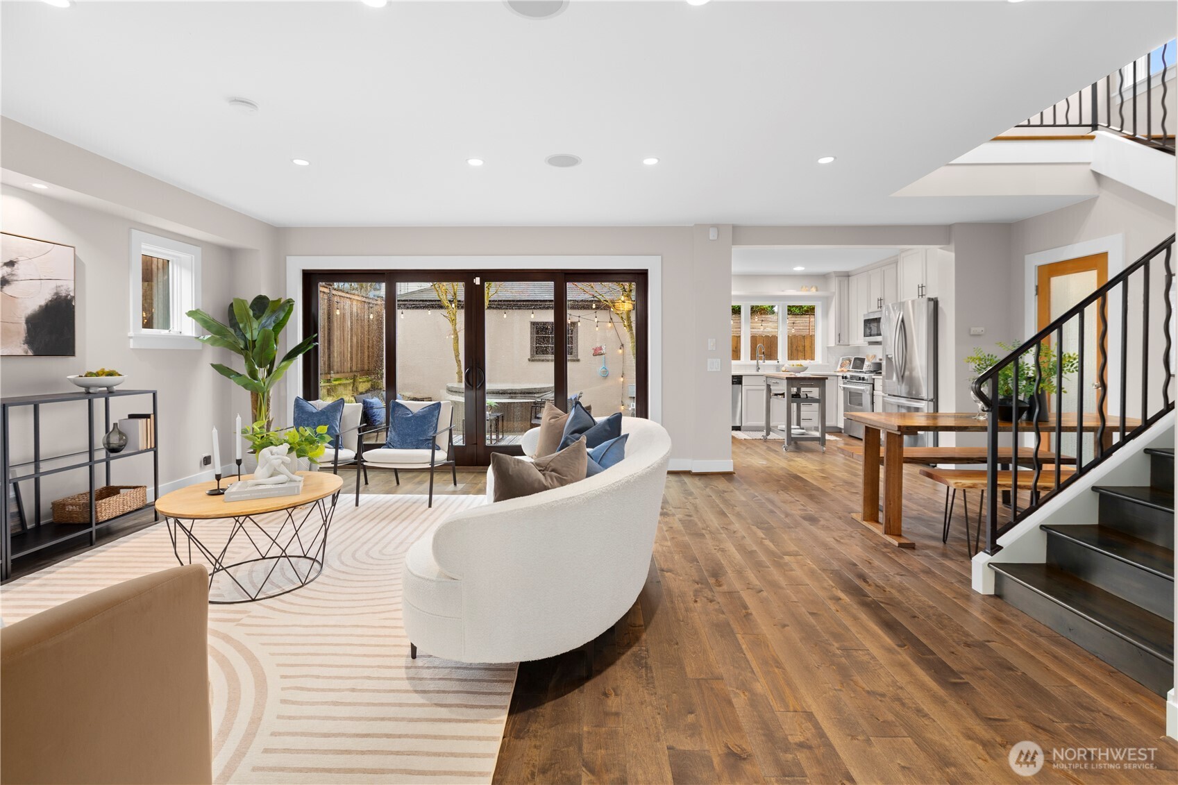 3773 Southwest Grayson Street Seattle, WA 98126 - Photo 7 of 40 a living room with furniture and a wooden floor