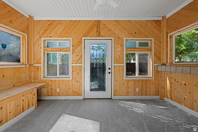 20 Valley Road Leeds, UT 84746 - Photo 19 of 57 Enclosed porch featuring diagonal wood-paneling walls and a built-in wood bench
