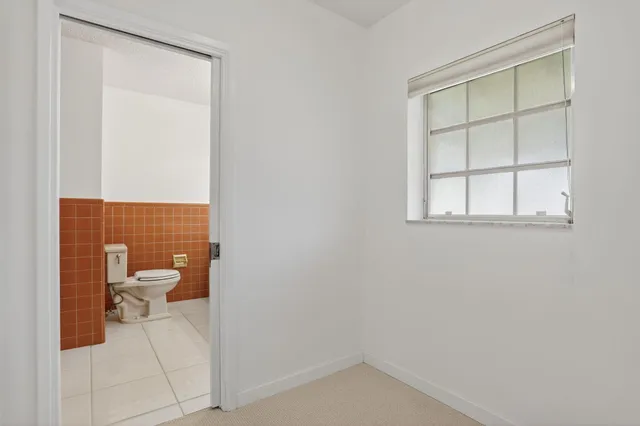 a bathroom with a toilet