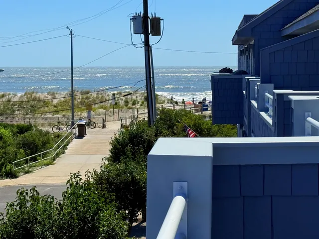a view of a yard with chairs