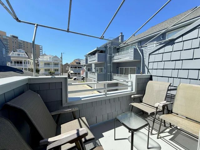a kitchen with a sink cabinets and appliances