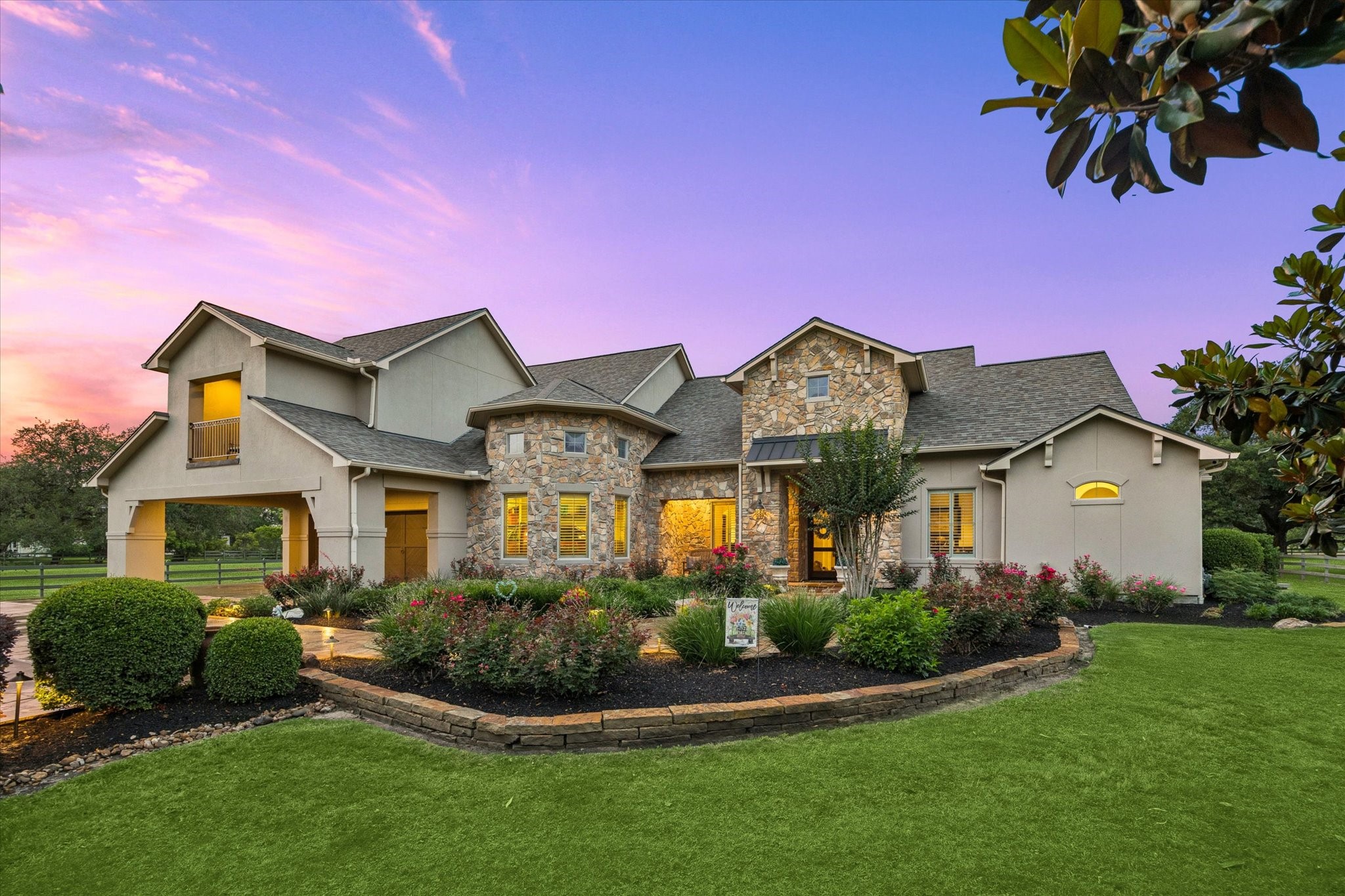 32102 Fulbrook Commons Fulshear, TX 77441 - Photo 1 of 50 Landscaping and timeless stonework enhance the home's impressive curb appeal from every angle.