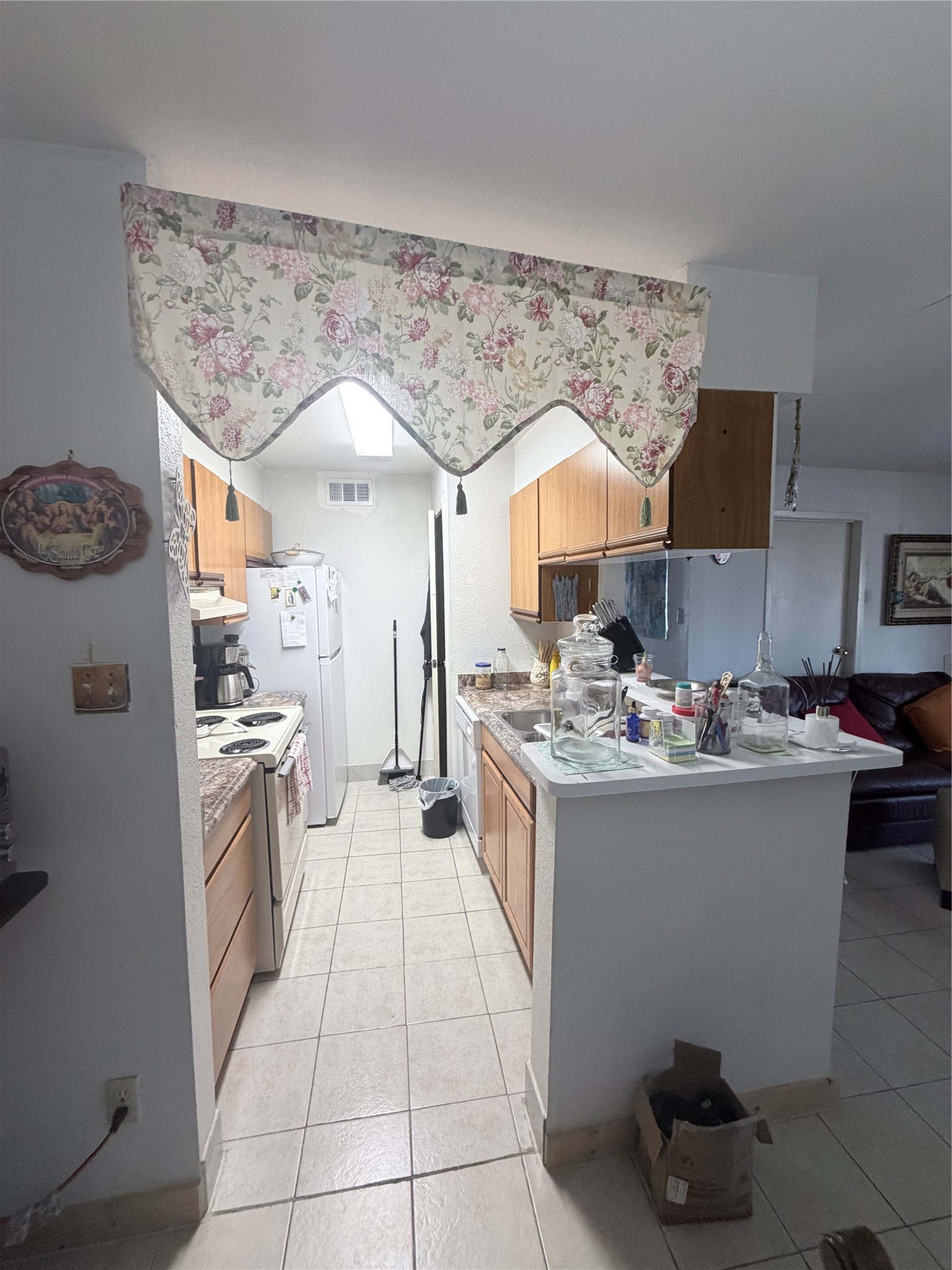 10100 South Gessner Road, Unit 606 Houston, TX 77071 - Photo 5 of 12 a kitchen with a sink and cabinets