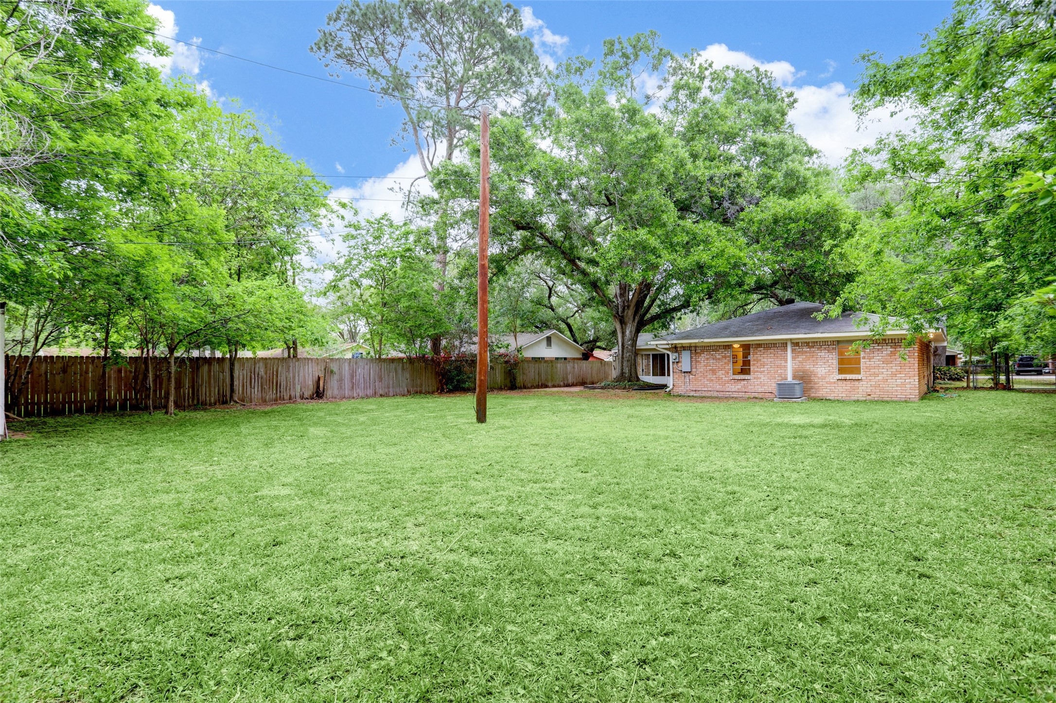 3611 Galway Lane Houston, TX 77080 - Photo 16 of 16 a view of a house with a backyard