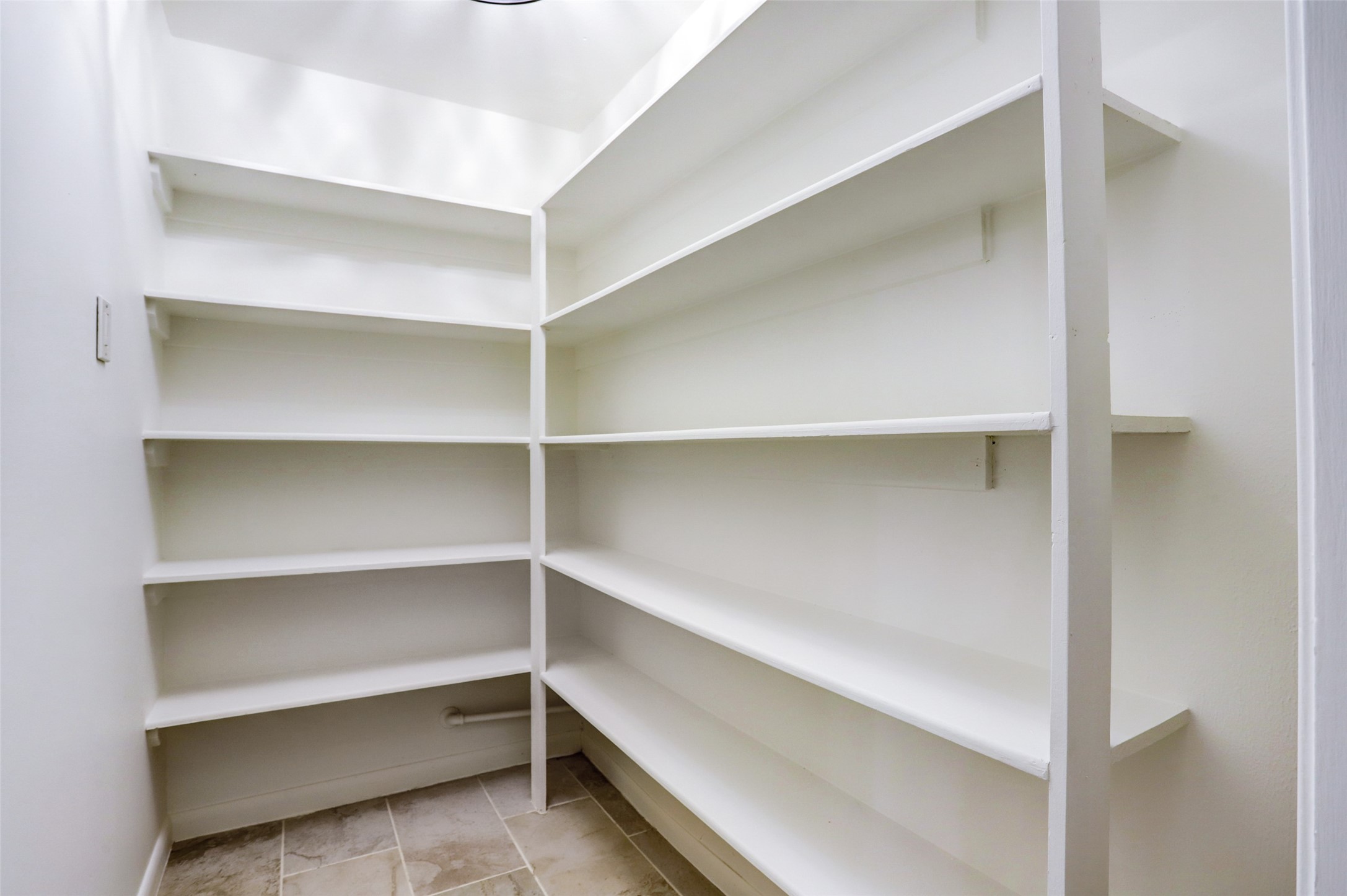 3611 Galway Lane Houston, TX 77080 - Photo 5 of 16 a view of walk in closet with empty racks