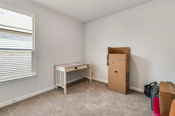 a room with furniture and a window