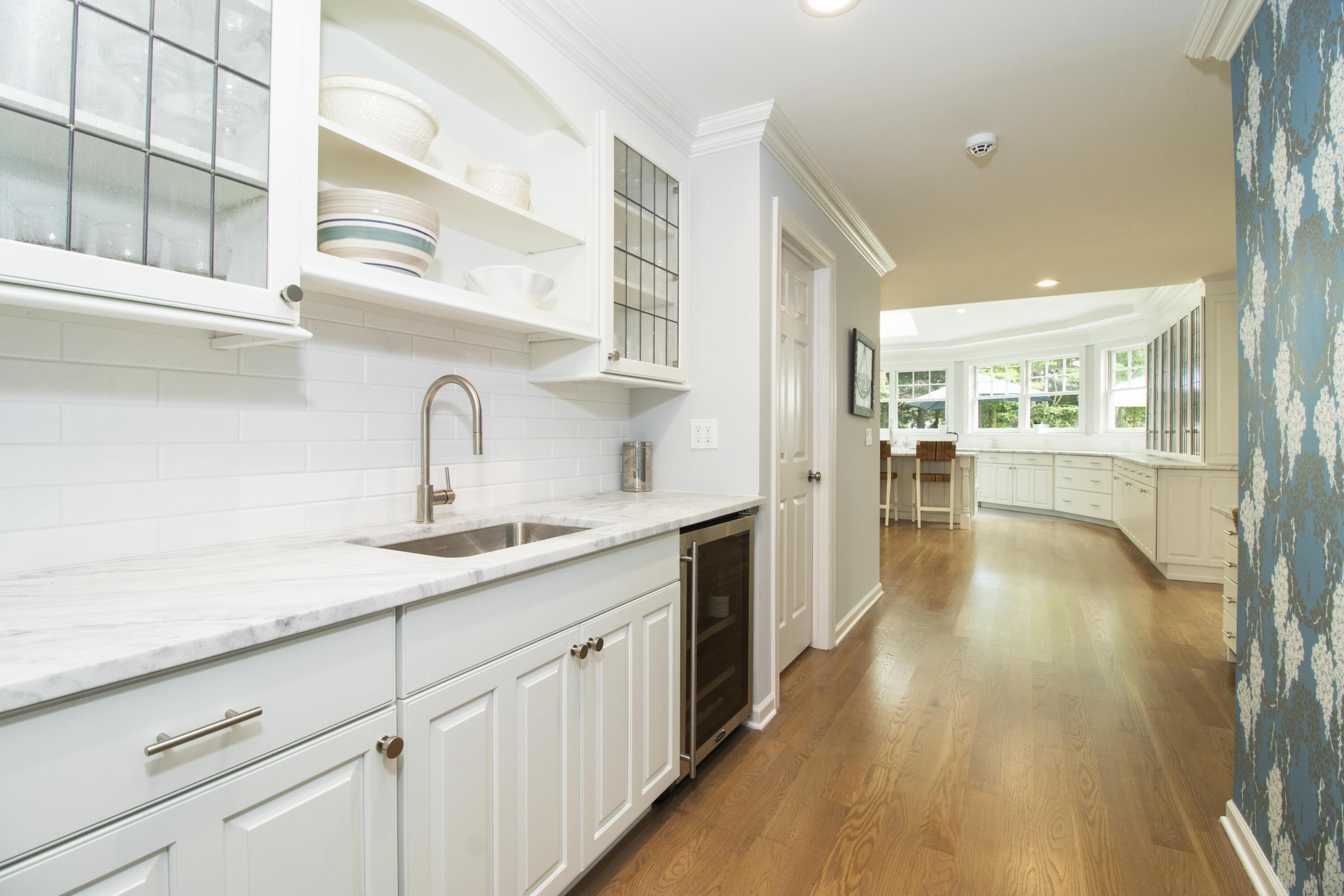 40 Pear Tree Point Road Darien, CT 06820 - Photo 20 of 50 a kitchen with a sink and cabinets
