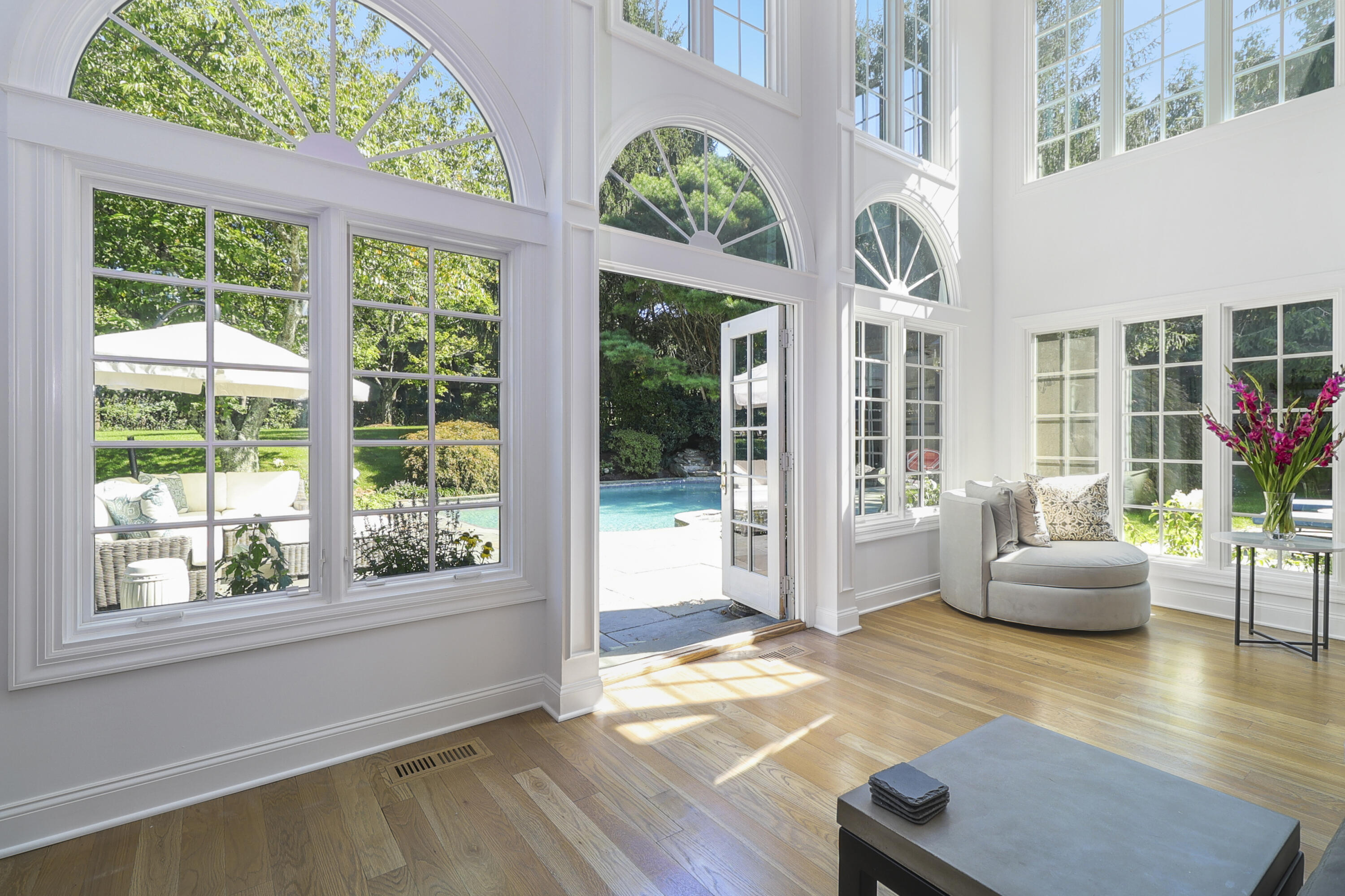 40 Pear Tree Point Road Darien, CT 06820 - Photo 28 of 50 a living room with furniture and a large window