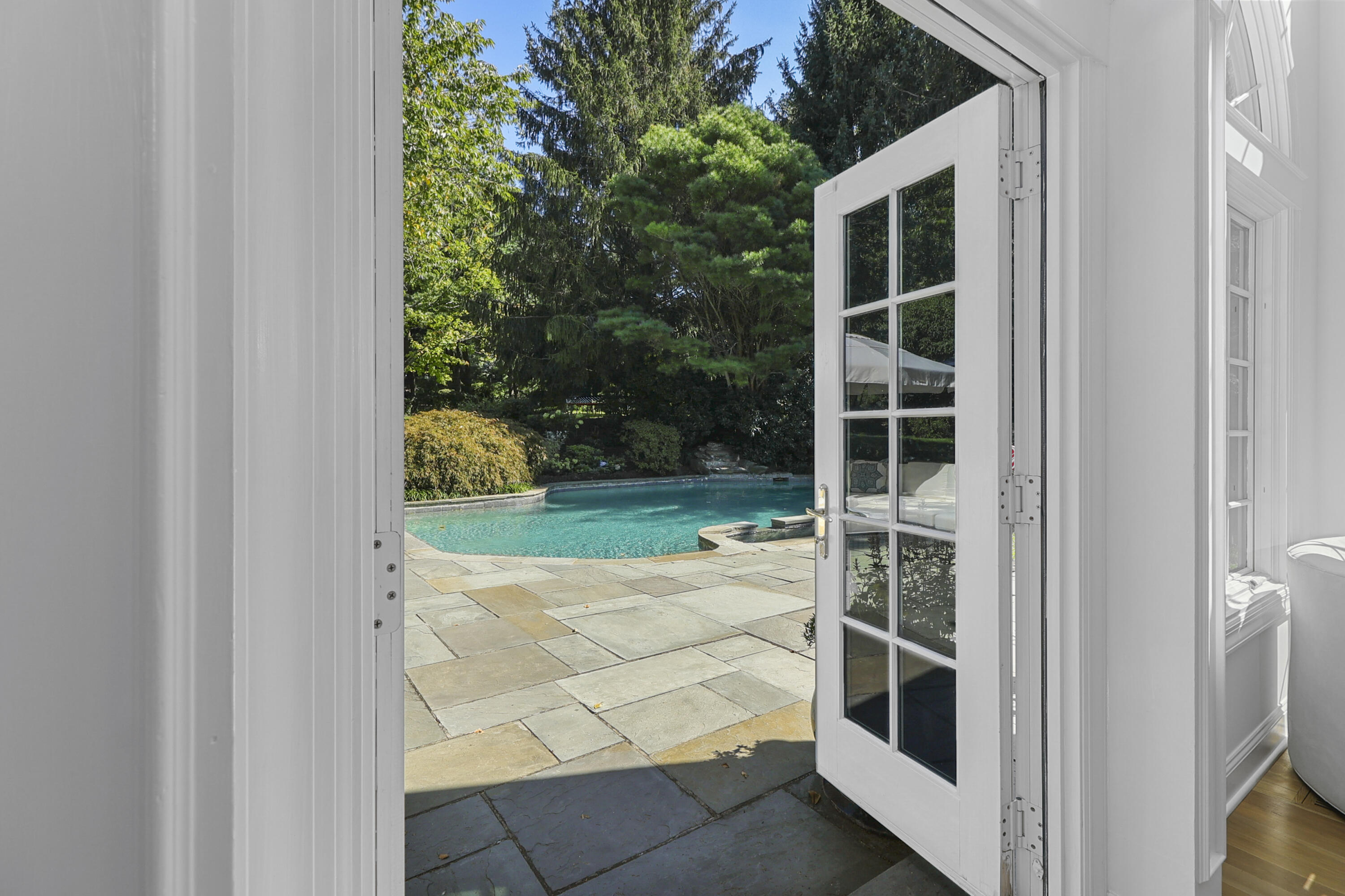 40 Pear Tree Point Road Darien, CT 06820 - Photo 29 of 50 a view of outdoor space and deck