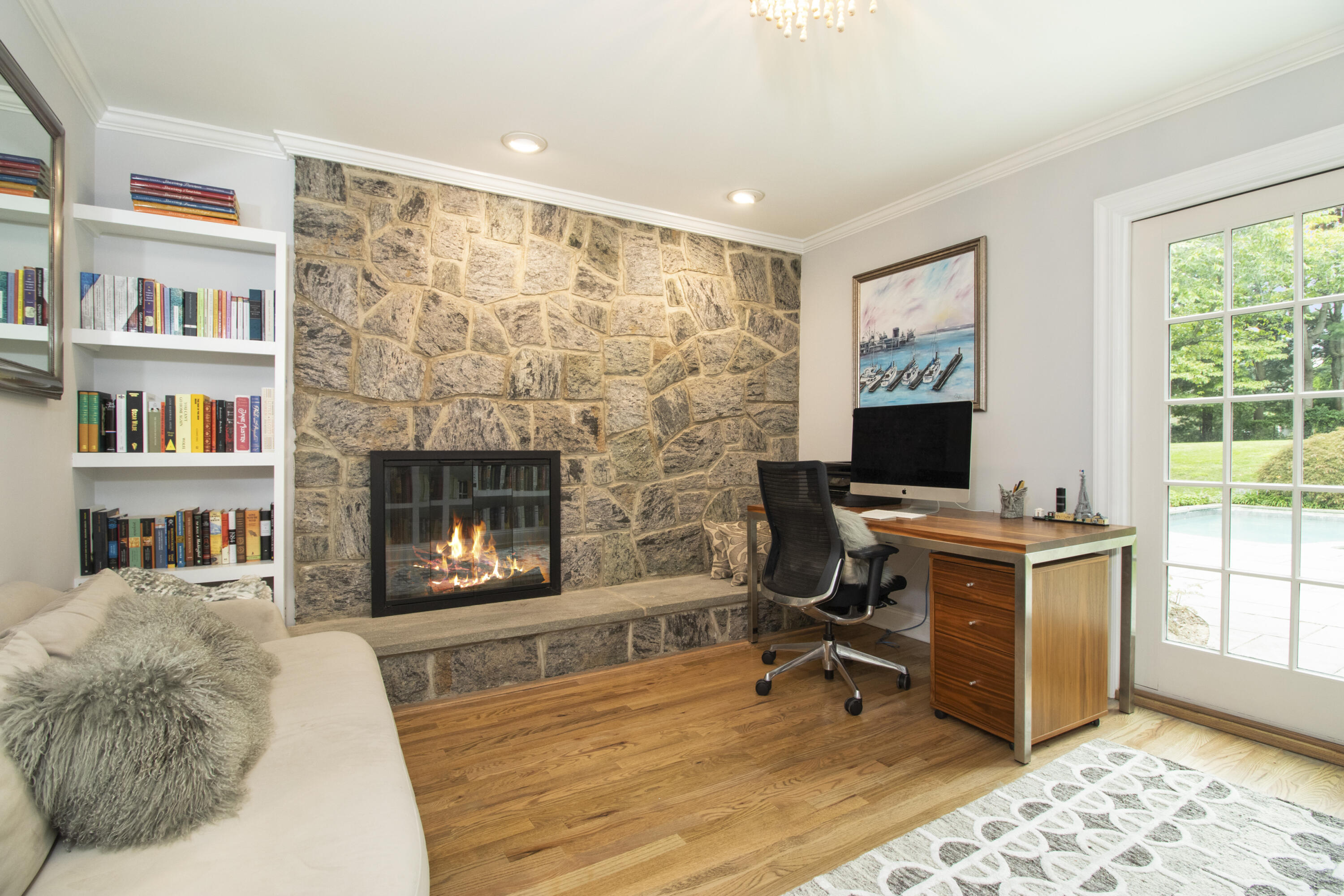 40 Pear Tree Point Road Darien, CT 06820 - Photo 33 of 50 a view of a livingroom with workspace and a window