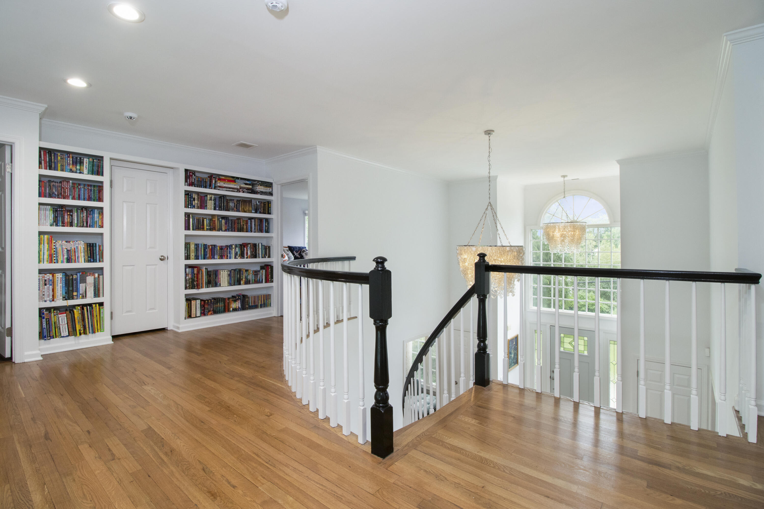 40 Pear Tree Point Road Darien, CT 06820 - Photo 38 of 50 a view of empty room with wooden floor and fan