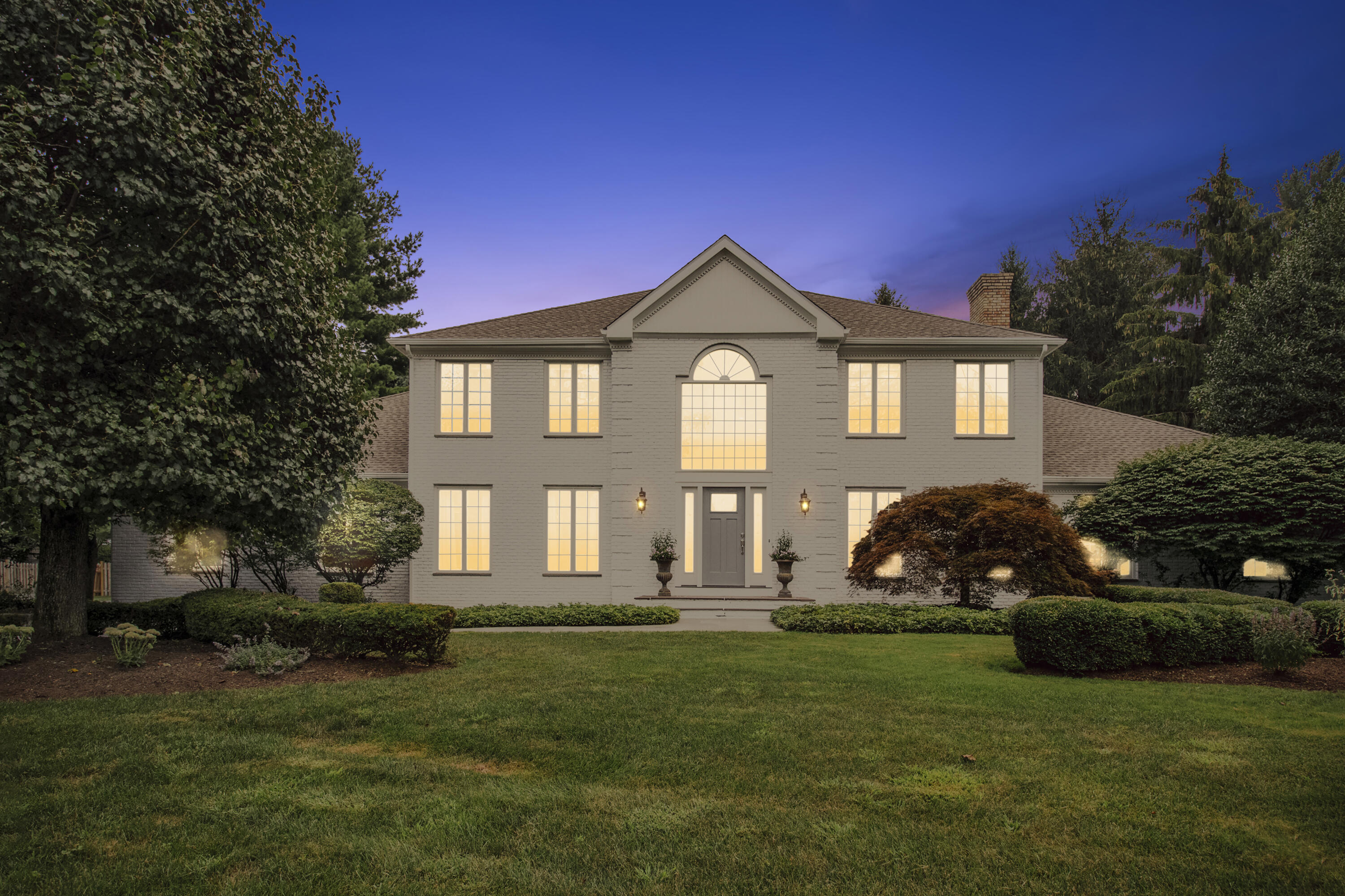 40 Pear Tree Point Road Darien, CT 06820 - Photo 50 of 50 a front view of a house with a garden