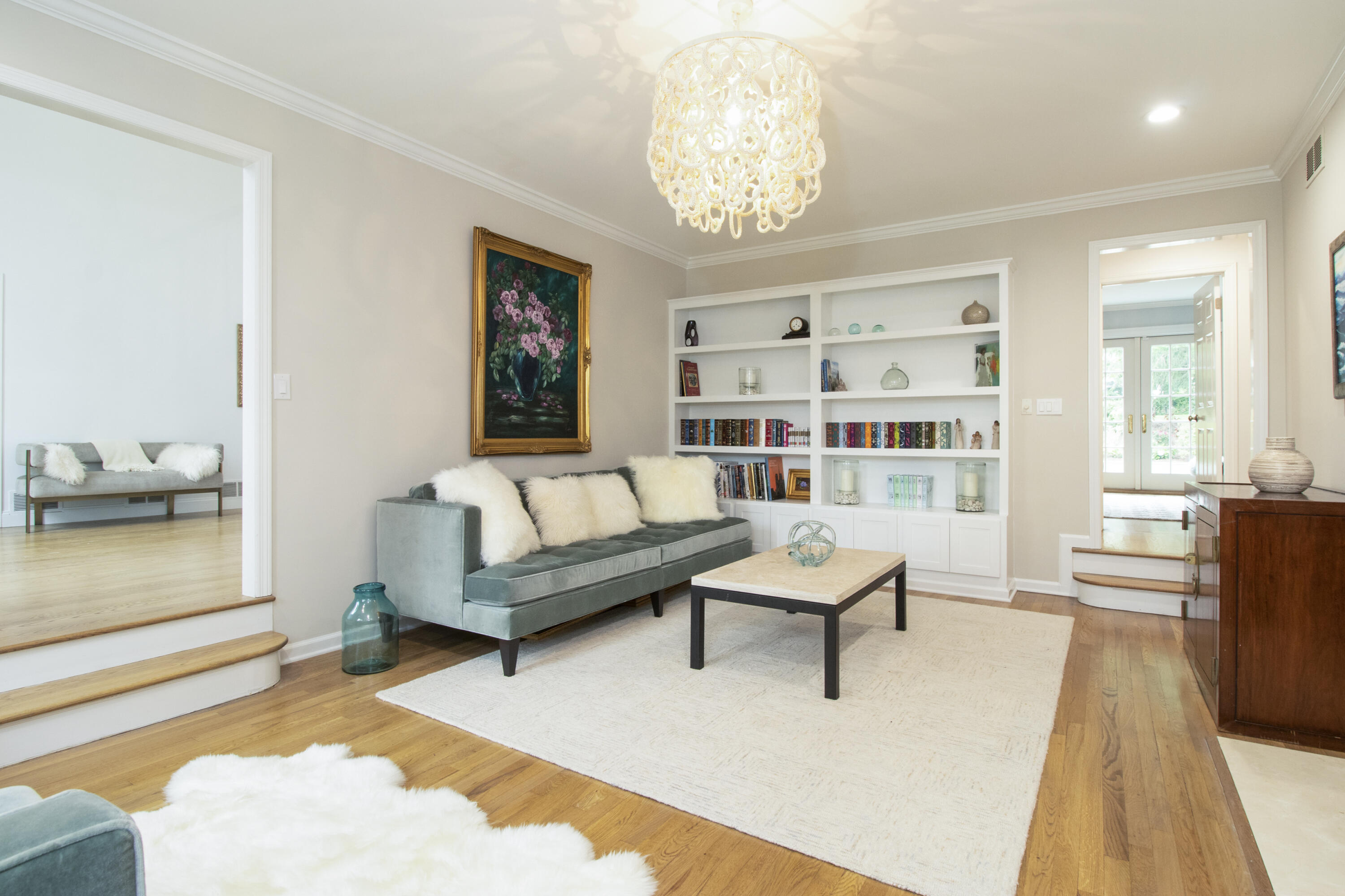 40 Pear Tree Point Road Darien, CT 06820 - Photo 9 of 50 a living room with furniture and a chandelier