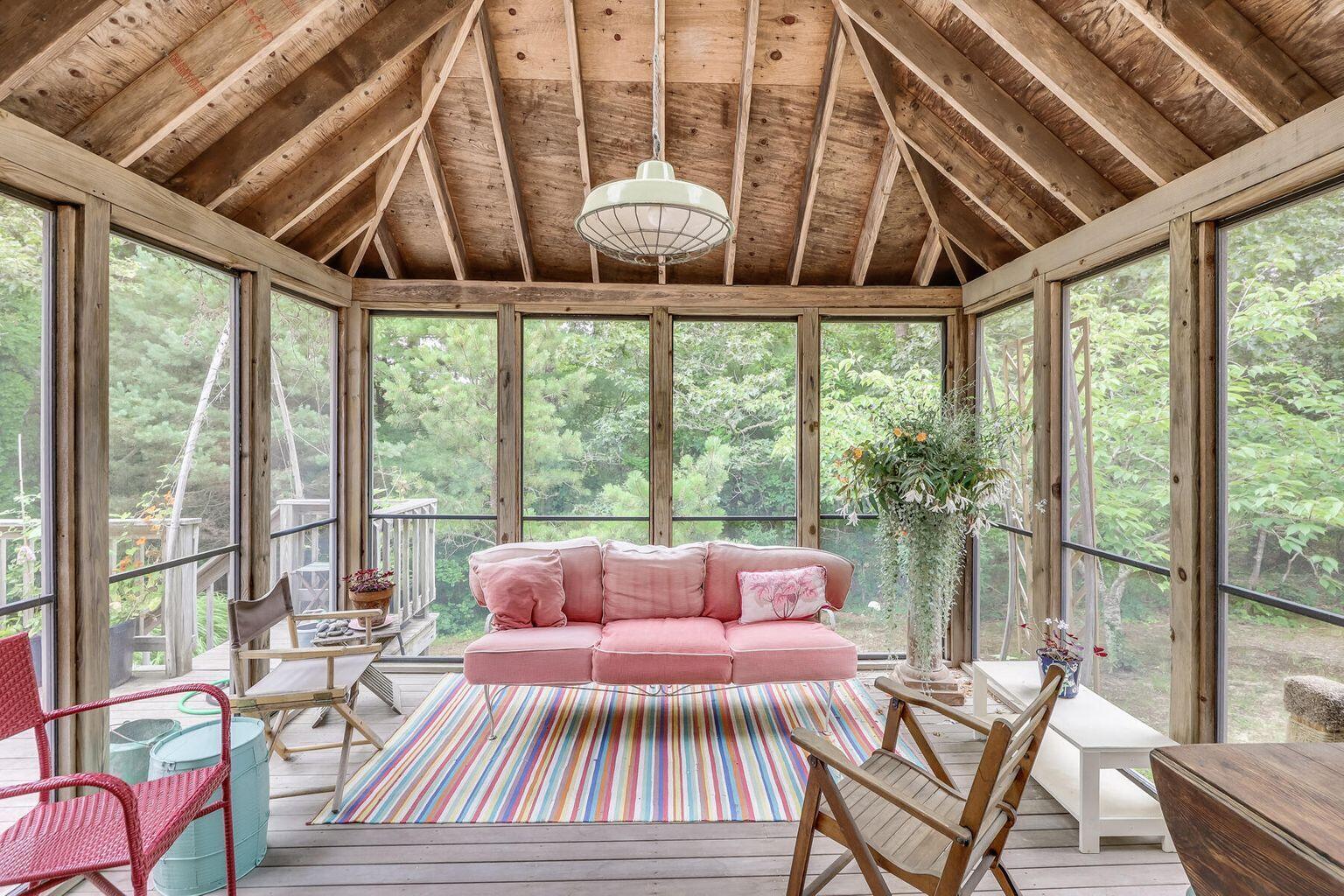660 Hay Road Eastham, MA 02642 - Photo 24 of 48 a living room with furniture and a large window