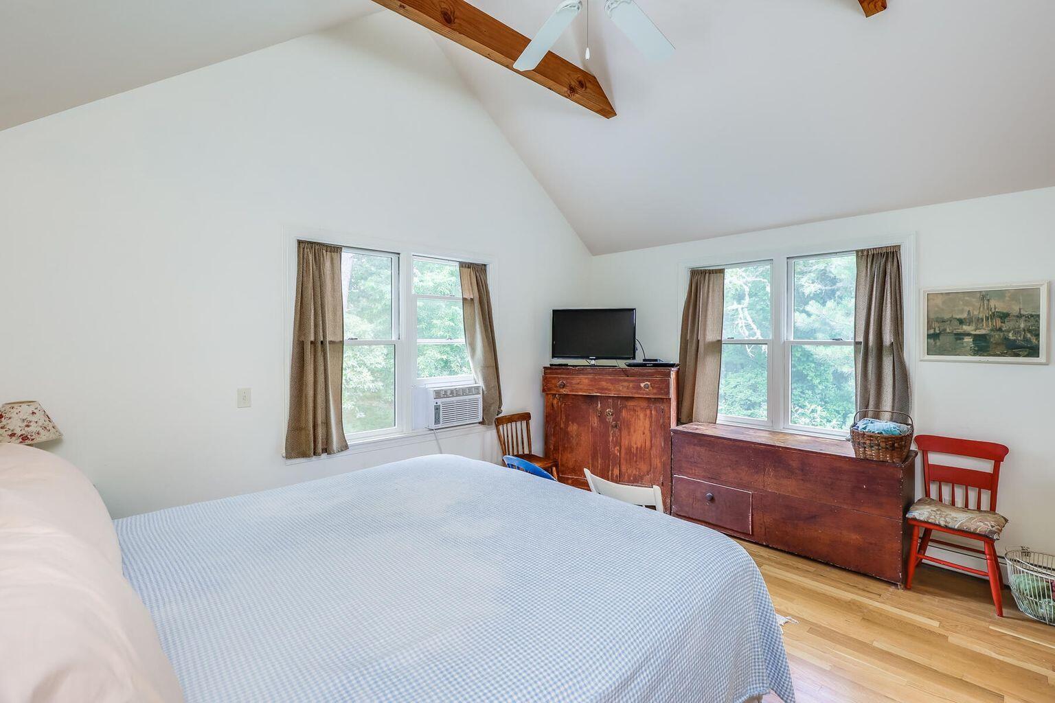 660 Hay Road Eastham, MA 02642 - Photo 27 of 48 a bed room with a bed and a television