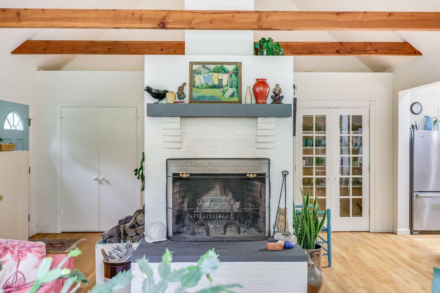 660 Hay Road Eastham, MA 02642 - Photo 8 of 48 a living room with furniture and a fireplace