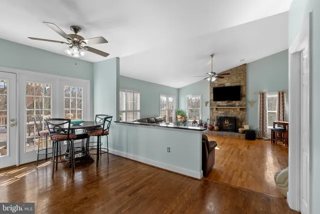 a bed room with a bed and a television