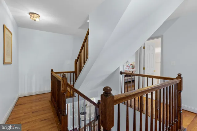 a bedroom with a bed and a table in it