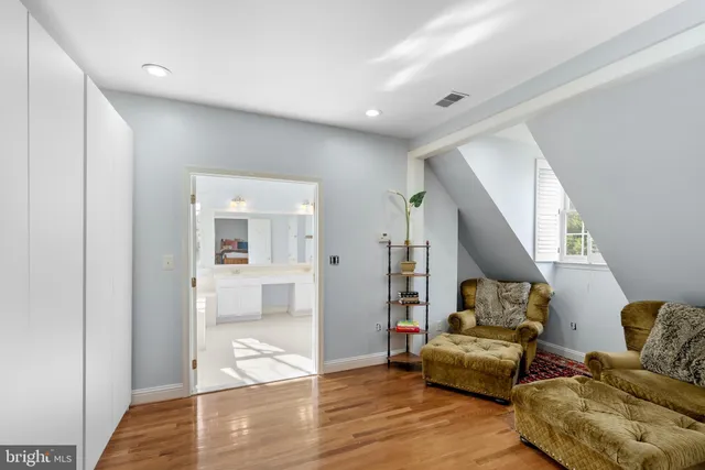 a bathroom with a shower a toilet and a sink