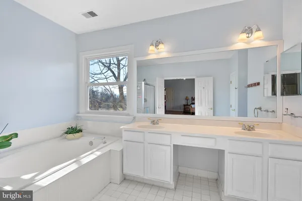 a view of a kitchen with granite countertop lots of counter top space and furniture