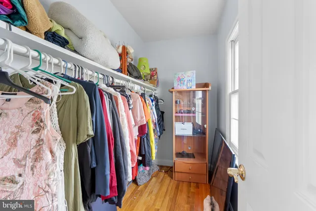 a view of a house with swimming pool and porch